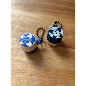 2 Vintage Coin Dispenser keychains blue and white plastic good condition